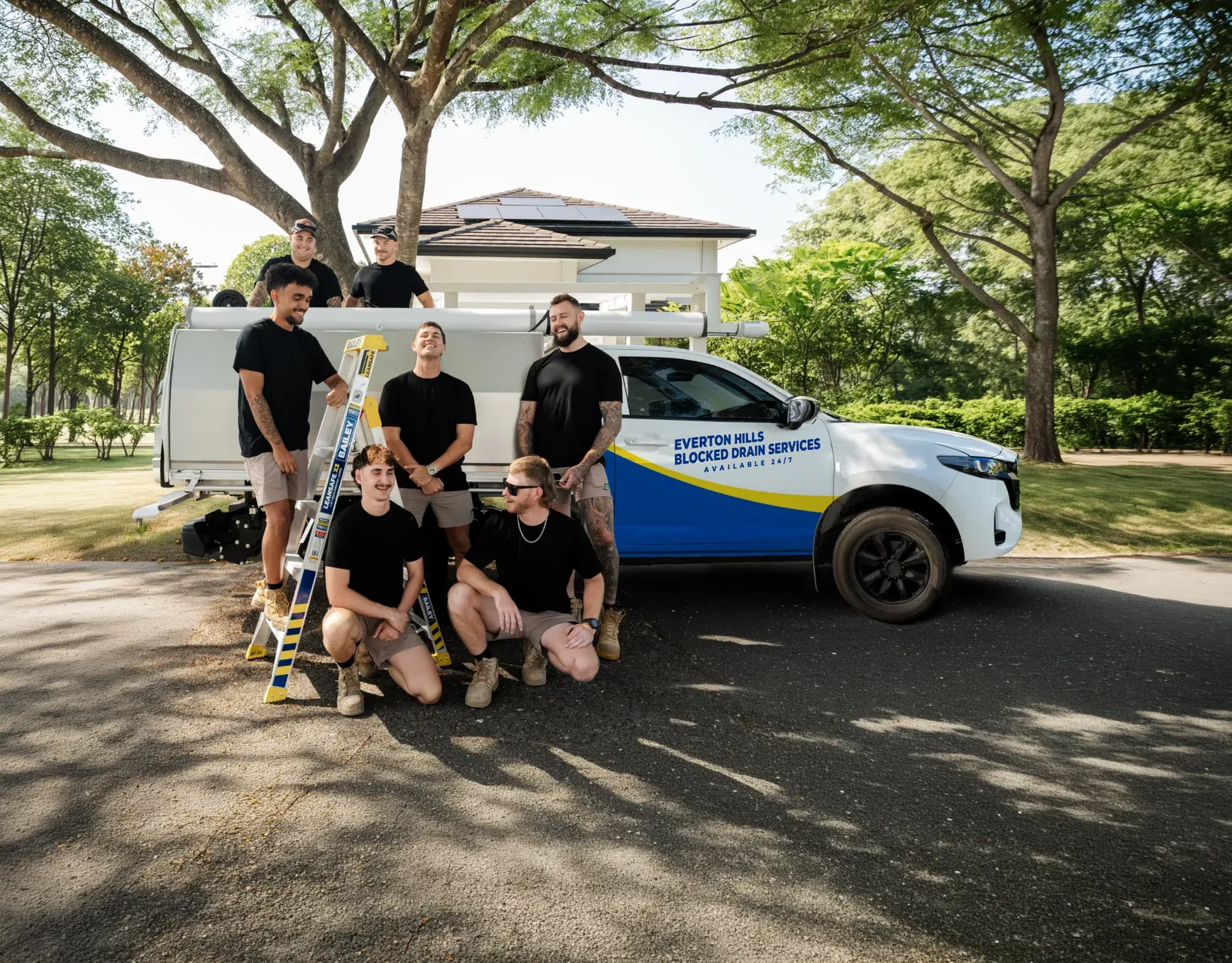 Everton Hills Blocked Drain Services ute and team